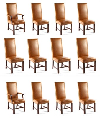 Lot 3127 - A Set of Twelve Close-Nailed Brown Leather Dining Chairs, modern, including two carvers, with...