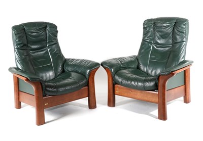 Lot 3130 - A Pair of Ekornes Green Leather Reclining Chairs, circa 2010, bearing Stressless brass plaque...