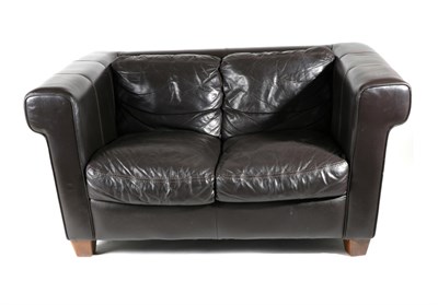 Lot 3133 - A Brown Leather Two-Seater Sofa, modern, with rounded square form arms and overstuffed seat, raised