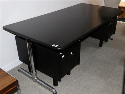 Lot 3140 - A Castelli Black Dense Resin with Rubber Nosing Rectangular Office Table, raised on polished...