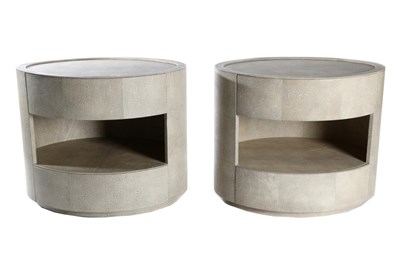 Lot 3156 - A Pair of Leather Shagreen-Effect Oval Bedside Tables, each with two bowfront drawers and raised on