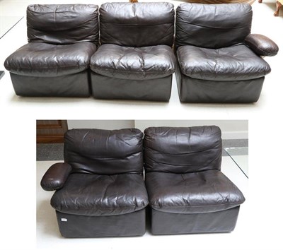 Lot 3165 - A Danish Five Piece Dark Brown Leather Modular Lounge Suite, the end sections with brushed...