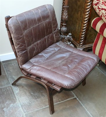 Lot 3178 - A Pair of 1970s Leather and Formed Laminate Lounge Chairs, Danish design, with brown squab cushions