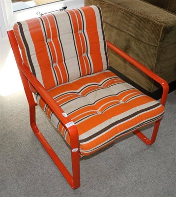 Lot 3179 - A 1960s Orange Metal Tubular Framed Lounge Chair, with canvas striped cushons, 62cm by 60cm by 70cm