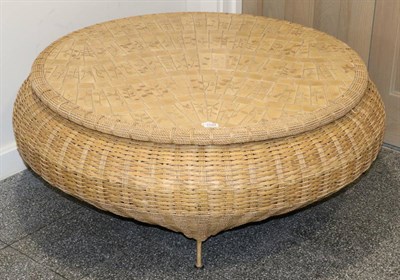 Lot 3194 - A Large Wicker Circular Coffee Table, modern, with a mosaic effect tiled top decorated with leaves