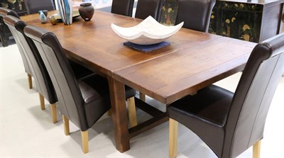 Lot 3196 - An Oak Extending Dining Table, modern, with cleated ends and square chamfered legs joined by an...