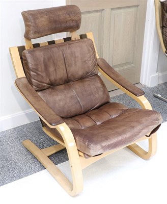 Lot 3200 - A 1970s Danish Design Brown Leather and Formed Laminate Easy Chair, 72cm by 70cm by 93cm