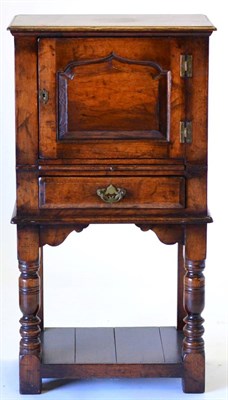 Lot 3004 - A Reproduction Joined Oak Cabinet, with a fielded cupboard door with pull-out side and frieze...