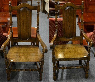 Lot 3026 - A Pair of Reproduction Oak Armchairs, in 18th century style, the moulded back supports above...