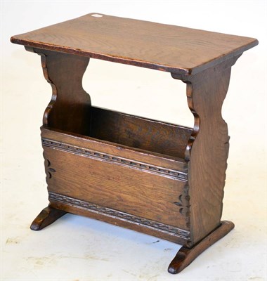 Lot 3040 - A Reproduction Oak Magazine Table, labelled Pratts of Bradford, the rectangular top above...