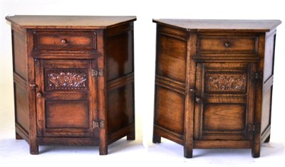 Lot 3041 - A Pair of Carved Oak Side Cabinets, 2nd half 20th century, labelled Siesta NH Chapman & Co,...