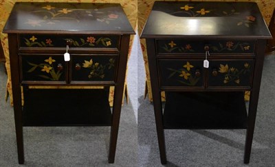 Lot 3048 - A Pair of Black and Floral Painted Side Tables, of recent date, fitted with a long drawer above two