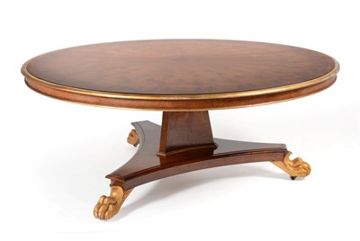 Lot 3051 - A Reproduction Brown Oak and Parcel Gilt Circular Dining or Centre Table, in Regency style,...