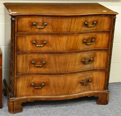 Lot 3057 - A Reproduction Mahogany Serpentine Shaped Chest, in George III style, with four graduated...