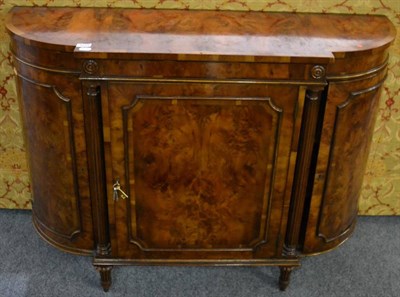 Lot 3058 - A Reproduction Burr Yewwood Cabinet, of breakfront form with three cupboard doors flanked by fluted