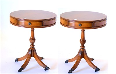 Lot 3067 - A Pair of Reproduction Yewwood Circular Drum Lamp Tables, in Regency style, with three small...