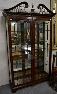 Lot 3089 - A Reproduction Mahogany Display Cabinet, in Chippendale style with fret carved scrolled...