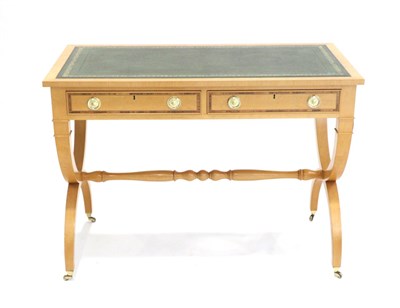 Lot 3090 - A Maple and Crossbanded Writing Table, of recent date, with a green and gilt leather writing...