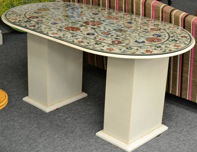Lot 3092 - A White Marble and Pietra Dura Dining Table, of recent date, inlaid with various marble samples...