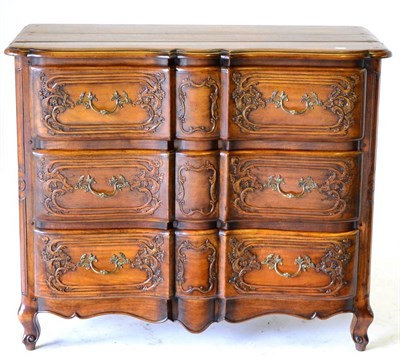 Lot 3096 - A Reproduction French Style Three Drawer Chest, of serpentine shaped form with carved drawer...
