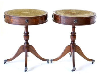 Lot 3100 - A Pair of Reproduction Mahogany Drum Lamp Tables, 20th century, with circular tops and worn...