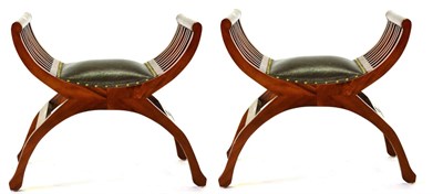 Lot 3101 - A Pair of Reproduction Indonesian Hardwood Stools, labelled Ancient Mariner, with slatted sides and