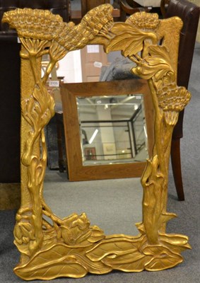 Lot 3105 - A Reproduction Gilt Mirror, in Art Nouveau style, the frame moulded with flowers and leaves,...