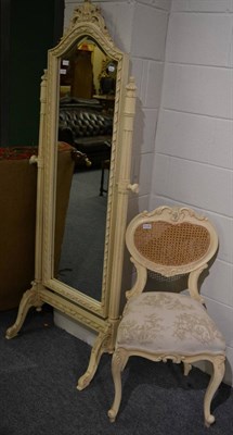 Lot 3126 - A Cream Painted Cheval Mirror, 20th century, the bevelled glass rectangular plate within a...