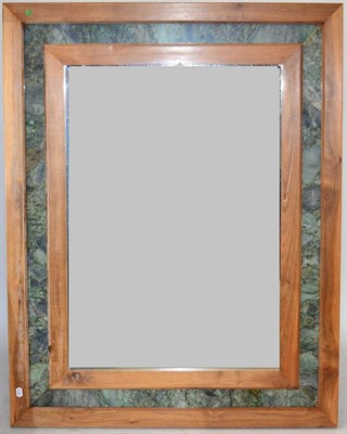 Lot 3130 - A Reproduction Hardwood and Green Marble Rectangular Mirror, with bevelled glass plate, 139cm wide