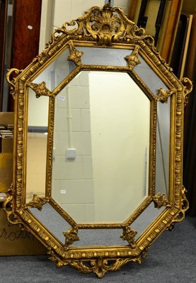 Lot 3139 - A Reproduction Gilt Marginal Mirror, of recent date, with a moulded frame headed by a C scroll...