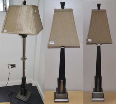 Lot 3150 - A Pair of Black Ash and Brushed Metal Table Lamps, of recent date, with beige silk shades, each...