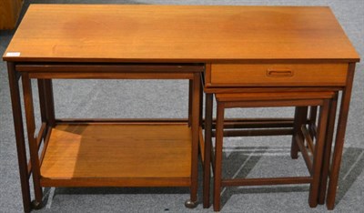 Lot 3168 - A 1970s Teak Writing Desk, the superstructure with a sliding door and three small drawers above...