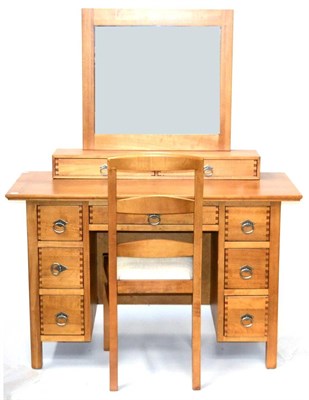 Lot 3176 - A Reproduction Dressing Table, of recent date, finished in light stained wood with seven...