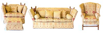 Lot 3190 - A Three Piece Knole Suite, of recent date, upholstered in gold and red pattern fabric,...