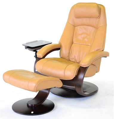 Lot 3194 - A Light Brown Leather Stressless Style Swivel Armchair, of recent date, with oak effect frame...