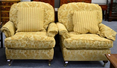 Lot 3197 - A Pair of Duresta Easy Chairs, upholstered in yellow and floral cut fabric, each with a striped...