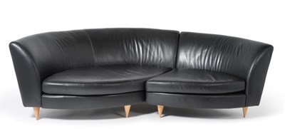 Lot 3216 - A Black Leather Content Corner Sofa, by Conran, in two sections with curved back support, two squab