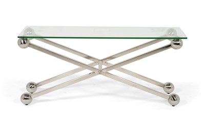 Lot 3228 - A Reproduction Glass Top Console Table, with rectangular top, raised on a polished metal X...