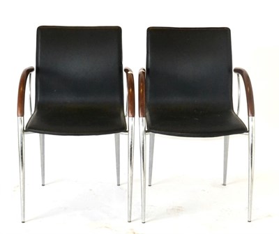 Lot 1007 - A Pair of Retro Chrome and Black Leather Armchairs, with curved tubular frames, 55cm by 45cm by...
