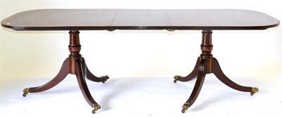 Lot 1013 - A Reproduction Mahogany, Satinwood Banded and Boxwood Strung Twin-Pedestal Dining Table in...