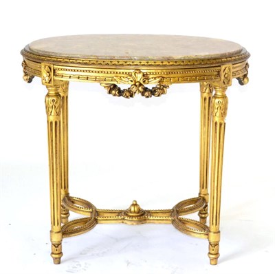 Lot 1014 - A Gilt and Pink Marble Oval Centre Table of recent date, raised on acanthus and fluted tapering...
