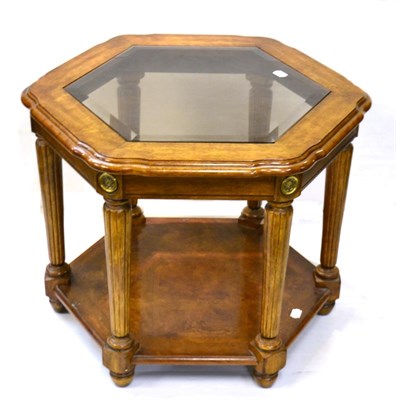 Lot 1022 - A Reproduction Walnut Hexagonal Shaped Table, with bevel glass plates above reeded tapering...