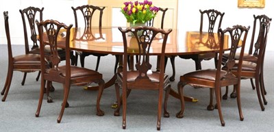 Lot 1023 - A Set of Ten Reproduction Mahogany Chippendale Style Dining Chairs of recent date, carved top rails