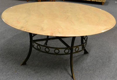 Lot 1026 - A Circular Pink Composition Marble Dining or Centre Table, raised on a wrought iron base with...