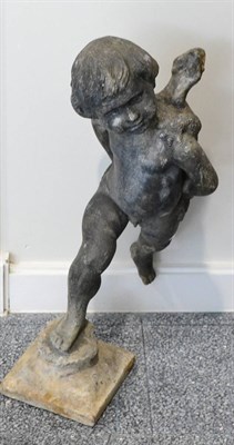 Lot 827 - A Lead Water Feature, probably 19th century, modelled as a putto gazing to the left with a...