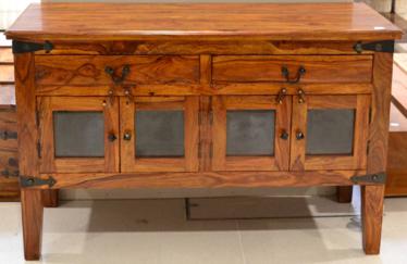 Lot 1051 - A Hardwood Sideboard of recent date, with two frieze drawers above four cupboard doors, raised...