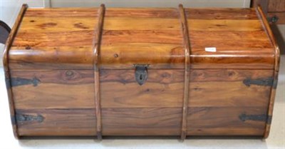 Lot 1054 - A Hardwood Trunk of recent date, the hinged lid with metal clasps and carrying handles, 100cm...