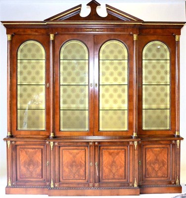 Lot 1061 - A Good Quality Reproduction Walnut and Gilt Metal Mounted Four Door Library Bookcase in the Regency