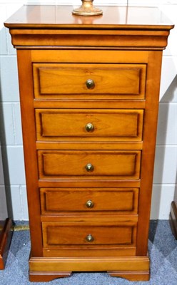 Lot 1064 - A Reproduction Straight Front Narrow Chest of Drawers, the moulded top above five drawers and...