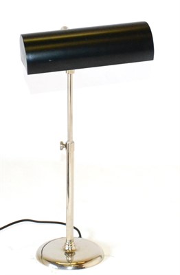 Lot 1103 - A Chrome Desk Lamp, unmarked, with black metal shade and rise-and-fall support raised on a circular